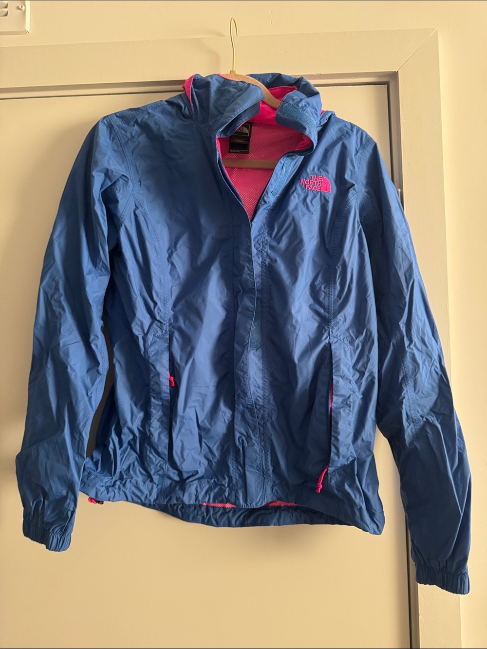 The North Face Blue Raincoat with Pink Accents